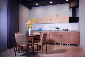 Eldhús eða eldhúskrókur á TM Apart Hotel