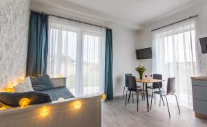 TV a/nebo společenská místnost v ubytování Vinorell Apartman