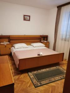 Posteľ alebo postele v izbe v ubytovaní Apartment Dalmatini