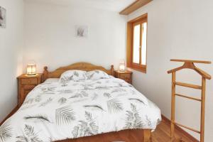 Rúm í herbergi á Magnifique appartement aux Diablerets avec vue imprenable
