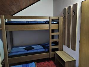 Postel nebo postele na pokoji v ubytování Chata Šumná