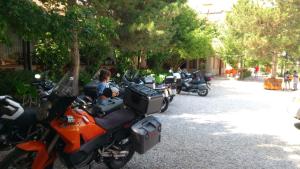 a group of motorcycles parked on a street at Hotel Aşıkoğlu in Bogazkale