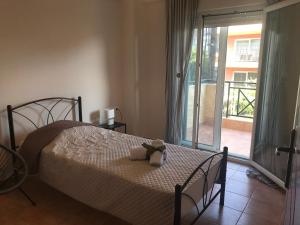 Ένα ή περισσότερα κρεβάτια σε δωμάτιο στο seashell