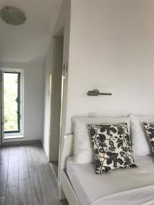 Postel nebo postele na pokoji v ubytování Guesthouse Davorka Bijelić