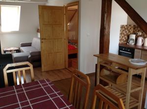 Posteľ alebo postele v izbe v ubytovaní King Apartman