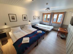Postel nebo postele na pokoji v ubytování Vertshuset Røros + 37 fotografií