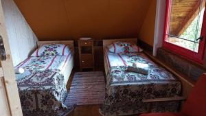 Ένα ή περισσότερα κρεβάτια σε δωμάτιο στο AGROTURYSTYKA TEOSIOWO