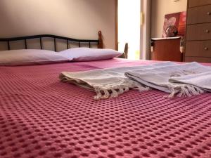 Postel nebo postele na pokoji v ubytování Sergios Apartment