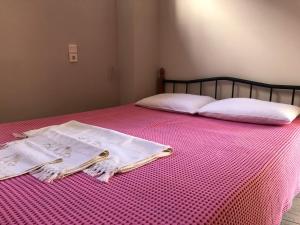 Postel nebo postele na pokoji v ubytování Sergios Apartment