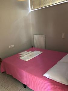 Postel nebo postele na pokoji v ubytování Sergios Apartment