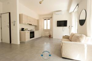 A kitchen or kitchenette at Ostia Holiday Lotito Loft