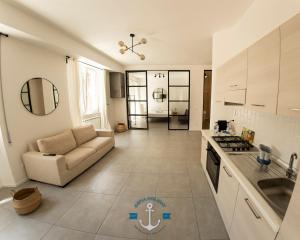 A kitchen or kitchenette at Ostia Holiday Lotito Loft Még 14 kép