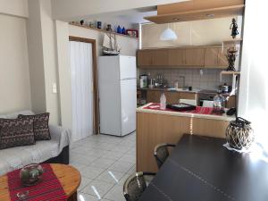 Kuchyň nebo kuchyňský kout v ubytování Sergios Apartment