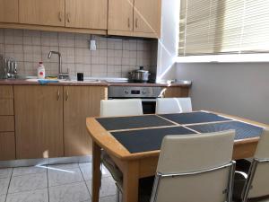 Kuchyň nebo kuchyňský kout v ubytování Sergios Apartment