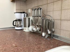 Kuchyň nebo kuchyňský kout v ubytování Sergios Apartment