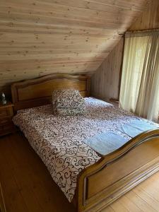 Giường trong phòng chung tại Šeimyninis namelis nr.2