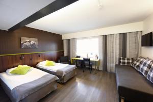 Postel nebo postele na pokoji v ubytování Finlandia Hotel Airport Oulu