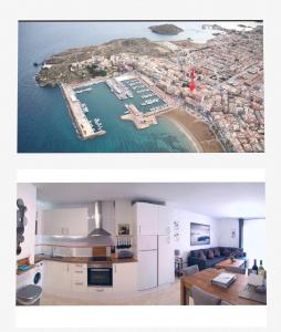 a kitchen and a view of a island at Our Sol in Puerto de Mazarrón