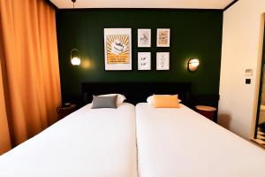 Voodi või voodid majutusasutuse ibis Styles Dijon Central toas