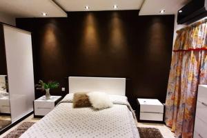 Ліжко або ліжка в номері Joecen Apartment