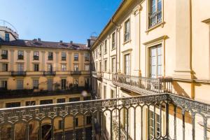 an apartment balcony in a building in paris at Golden Eagle in Turin