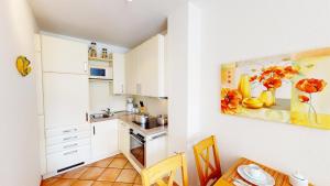 Kuchyň nebo kuchyňský kout v ubytování Karpendiek Haus Nr. 37 + 7 fotografií