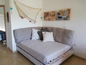 Postel nebo postele na pokoji v ubytování Le Torrette di Anna - Tropea