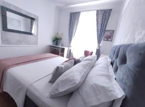 Posteľ alebo postele v izbe v ubytovaní Apartment Helena