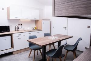 Kuchyň nebo kuchyňský kout v ubytování Hotel TAMMEL