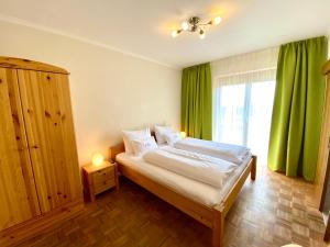 Łóżko lub łóżka w pokoju w obiekcie Pleschinhof