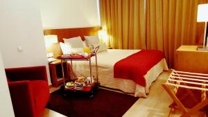 Cama ou camas em um quarto em Hotel Jose Alberto