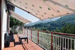 a balcony with a view of a mountain at Campinola Holiday Home PRIVATE POOL in Tramonti