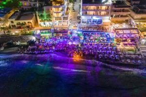 an aerial view of a nightclub at night at Kahlua Boutique Hotel in Hersonissos