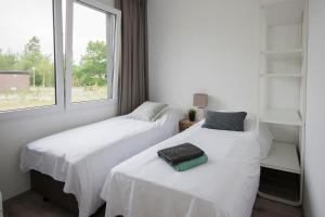 Afbeelding uit fotogalerij van RCN Vakantiepark Bungalow de Dukdalf in Kamperland +23 foto's