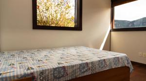 Estâncias da Serra dos Alves客房内的一张或多张床位