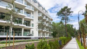 Zahrada ubytování VacationClub - ApartPark Albus Apartament 318 + 8 fotografií