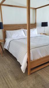 Postel nebo postele na pokoji v ubytování Hotel Secreto