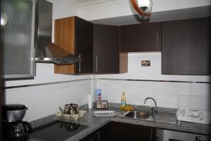 A kitchen or kitchenette at Appartement Mirador De Majorelle