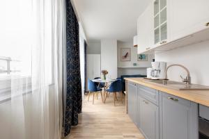Kuchyňa alebo kuchynka v ubytovaní Short Stay Apartments