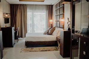 Postel nebo postele na pokoji v ubytování Hotel Niagara