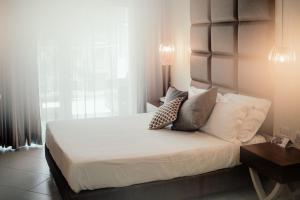 Postel nebo postele na pokoji v ubytování Hotel Niagara