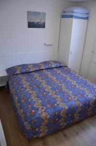 Postel nebo postele na pokoji v ubytování Zomerhuisje achter Torenlicht