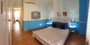 Ένα ή περισσότερα κρεβάτια σε δωμάτιο στο B&B Dimora Paolina