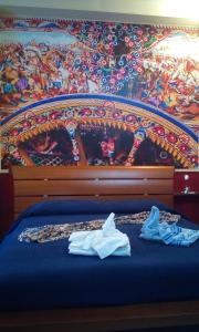 Posteľ alebo postele v izbe v ubytovaní Villa Morgante B&B