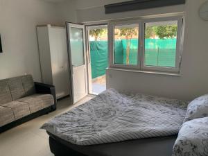 Postel nebo postele na pokoji v ubytování Studio apartman Miko