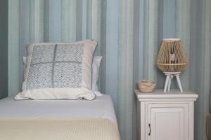 A bed or beds in a room at Neoclassical manor house