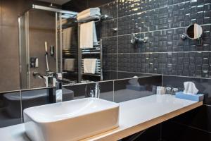 Koupelna v ubytování Hotel TAMMEL