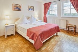 Postel nebo postele na pokoji v ubytování Gutshotel Baron Knyphausen + 37 fotografií
