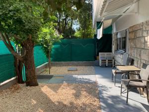 Patio nebo venkovní prostory v ubytování Studio apartman Miko