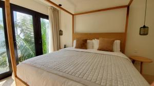Postel nebo postele na pokoji v ubytování Hotel Secreto